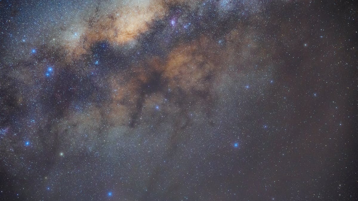 Captivating image of the Milky Way Galaxy illuminating the night sky with vibrant stars and cosmic clouds.